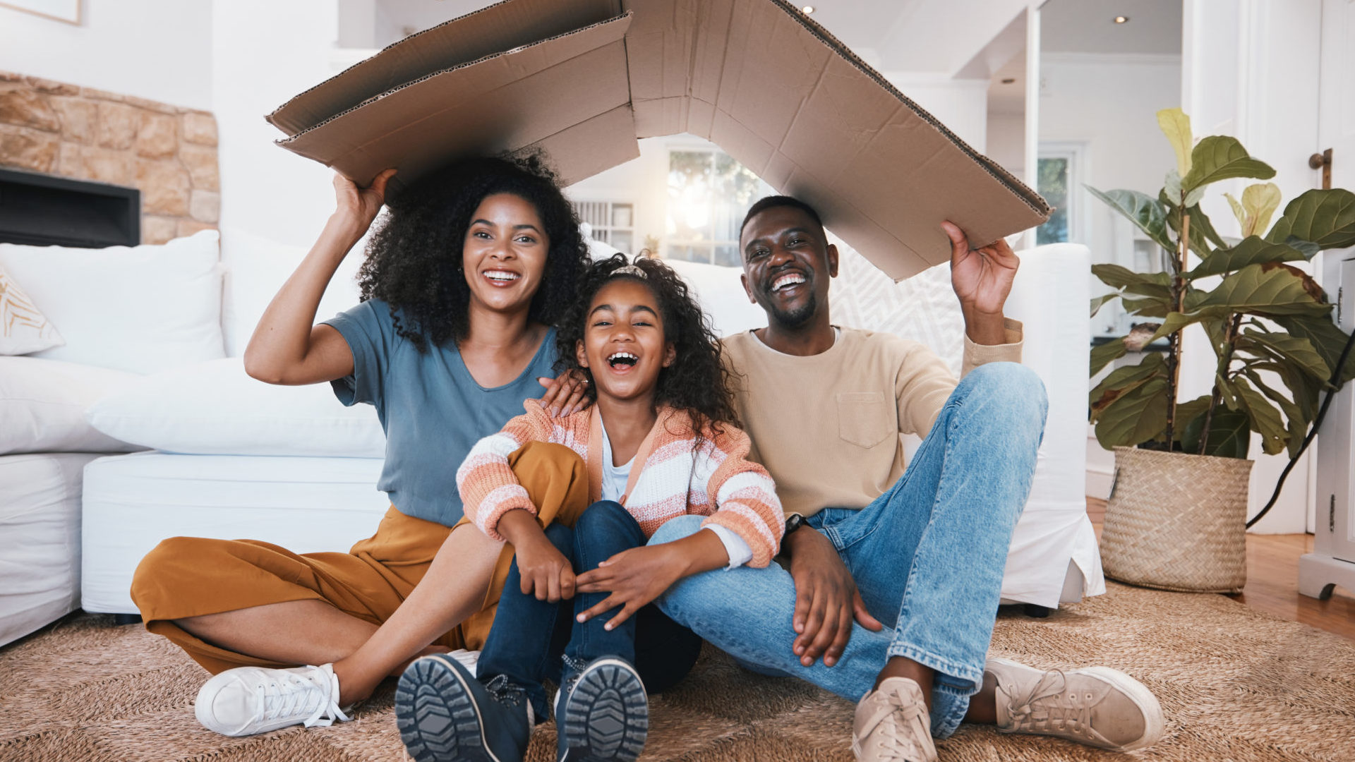 Family, roof and insurance, security and protection at home with parents, child and happy in portra